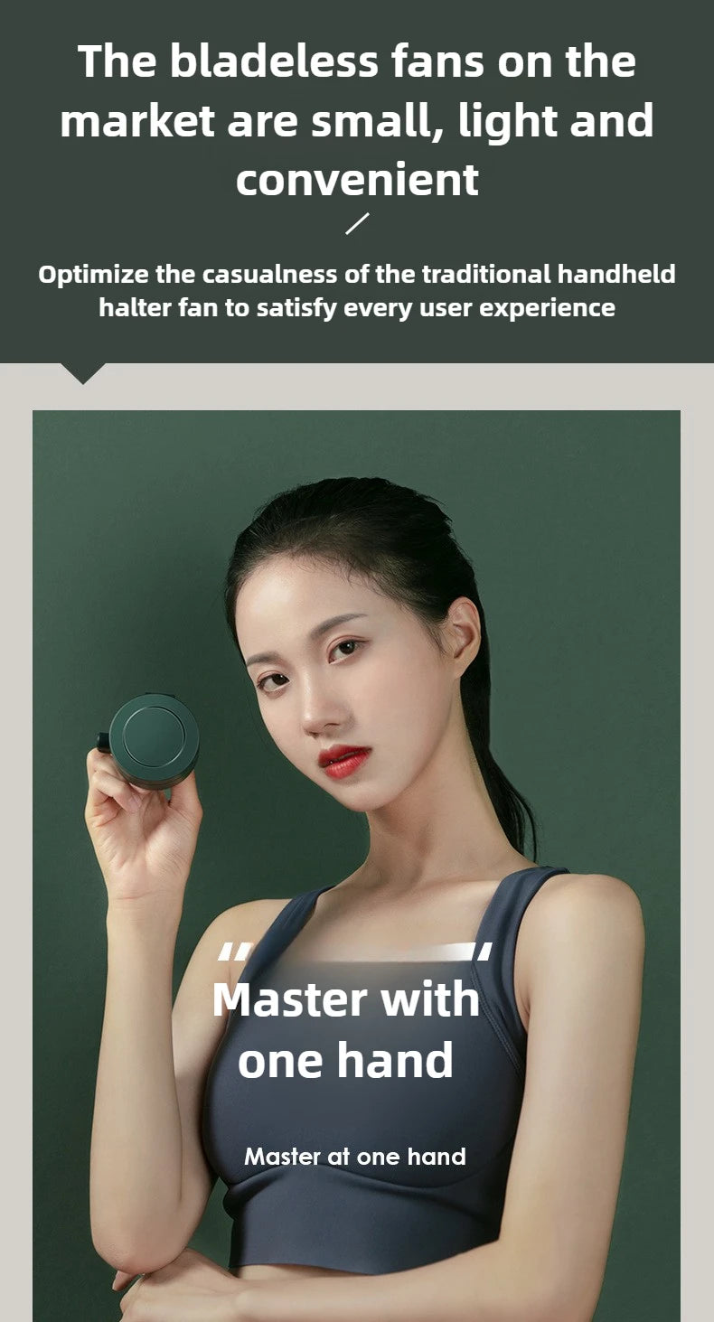 A woman holds a small, handheld fan against her face, demonstrating its convenient use.