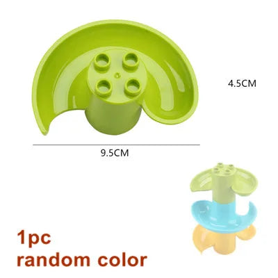 A lime green marble run building block set with tracks and funnels