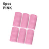 Seis esponjas de limpieza PVA rosadas colocadas en fila.