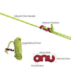 Green reflective camping guy lines with aluminum tensioners and various sized knots