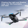 A black 4K GPS drone with a gimbal is shown flying over a snowy mountain landscape.