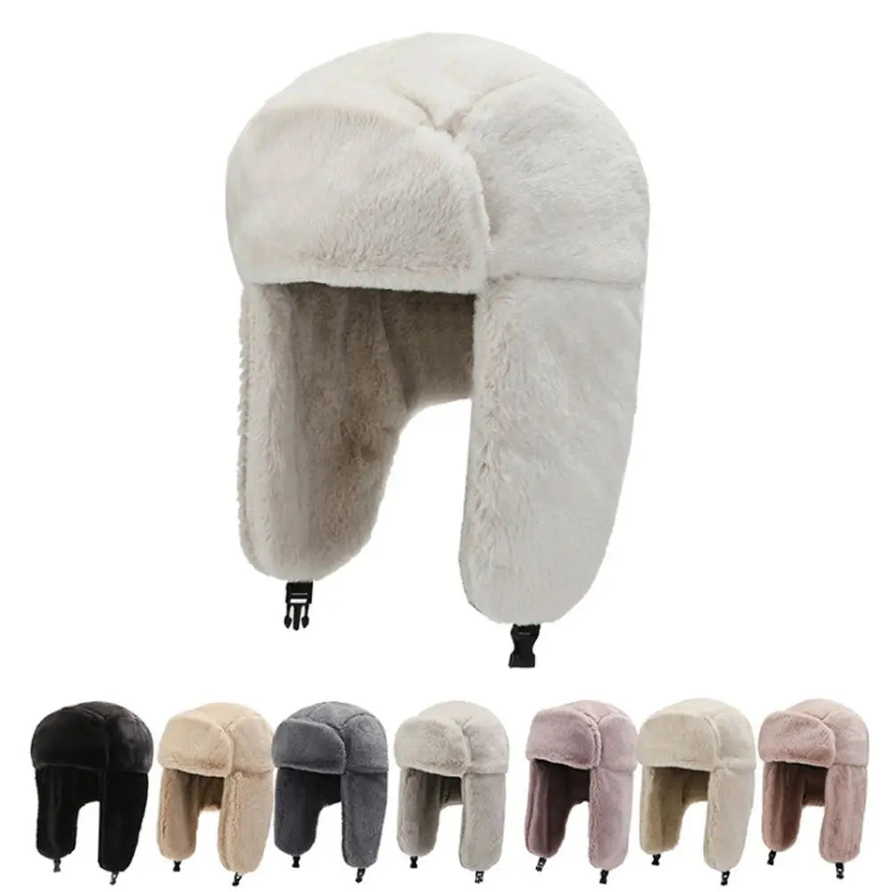 A collection of classic Russian Ushanka trapper hats in black, beige, and gray fur.