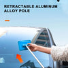 A hand is using a retractable aluminum alloy pole and cleaning brush to wipe the windshield of a car.