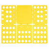 A yellow clothes folding board with multiple sections and holes for organizing laundry.