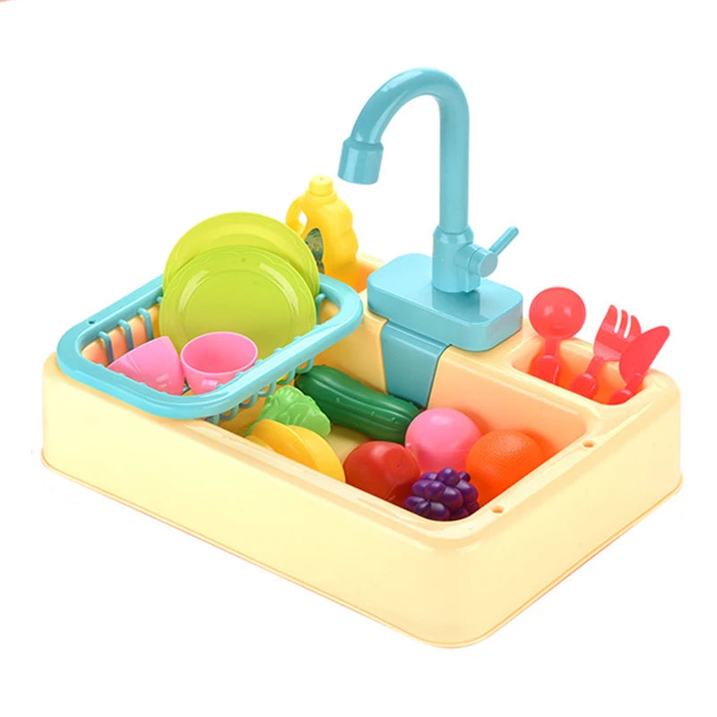 A kids pretend play kitchen sink set featuring a yellow plastic basin, green and pink food items, and a blue faucet.