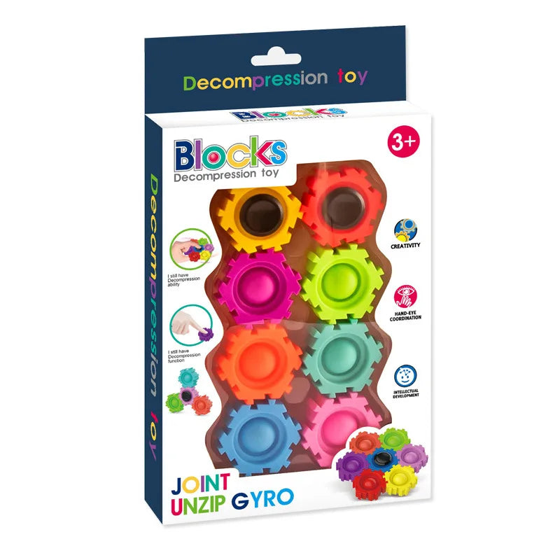 A box of Blocks Decompression toy featuring colorful fidget spinner blocks for play