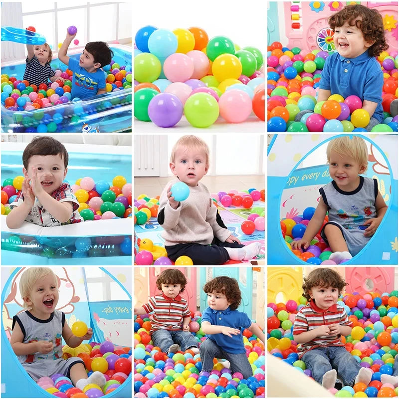 A collection of colorful plastic balls filling a blue inflatable ball pit for children.