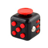 Cubo fidget negro con puntos rojos y parte superior roja, usado para aliviar el estrés.