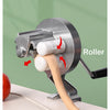 A silver roller machine is shown with a wooden pasta strand being rolled onto a flat surface.