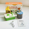A box and a green music player device for children's phonograph learning cards are displayed on a white surface.
