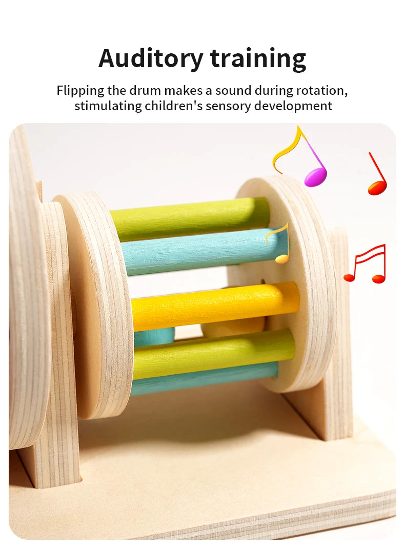 Montessori wooden spinning drum with colorful wooden rods for auditory training and sensory development.