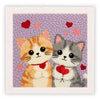 Bordado a mano con dos adorables gatitos en tonos naranja y gris sobre fondo morado.