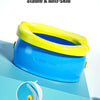 Blue Banana Baby Toilet with yellow rim and green lid shown on a light blue surface.