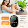 A woman is using a black digital LCD display and four buttons to control a cordless heated vibration ankle massager.