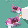 A pink electric airplane toy with a gimbal design is shown avoiding an obstacle.