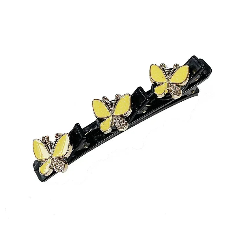 Clip para el pelo negro de doble capa trenzada con adornos de mariposa doradas