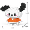A white and black micro building block figurine of a panda with orange accents.