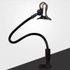 Soporte flexible para teléfono con cuello de ganso negro y abrazadera, sobre fondo gris.