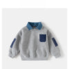 A gray fleece pullover sweatshirt for boys featuring a denim collar and navy blue accents.