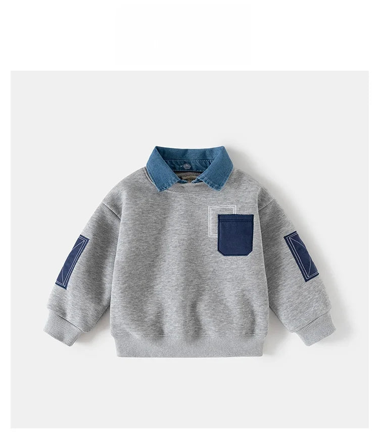 A gray fleece pullover sweatshirt for boys featuring a denim collar and navy blue accents.