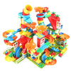 A colorful marble run building blocks set featuring tracks, funnels, and various structures.