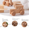 A wooden toy car shaped like a truck, used for toddlers, showing various options and a polished finish.