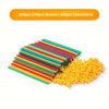 A collection of colorful straws and connectors for a building block set.