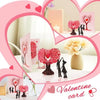 A pink Valentine card featuring a 3D pop-up love tree with a couple silhouette.