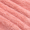 Close-up of a pink baby fleece hooded romper with a zipper texture.