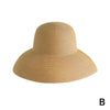 A beige wide brim straw sun hat for women.