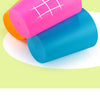 A stack of three color-matching cups in pink, orange, and blue on a light green background.