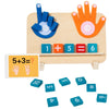 A wooden finger counting number learning toy showing a handprint and numbered blocks for addition problems.