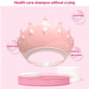 Pink adjustable baby shampoo crown with a soft silicone bath visor displayed on a pink stand.