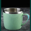 A light green double-wall insulated stainless steel mug with a silver inner lining and an ergonomic handle.