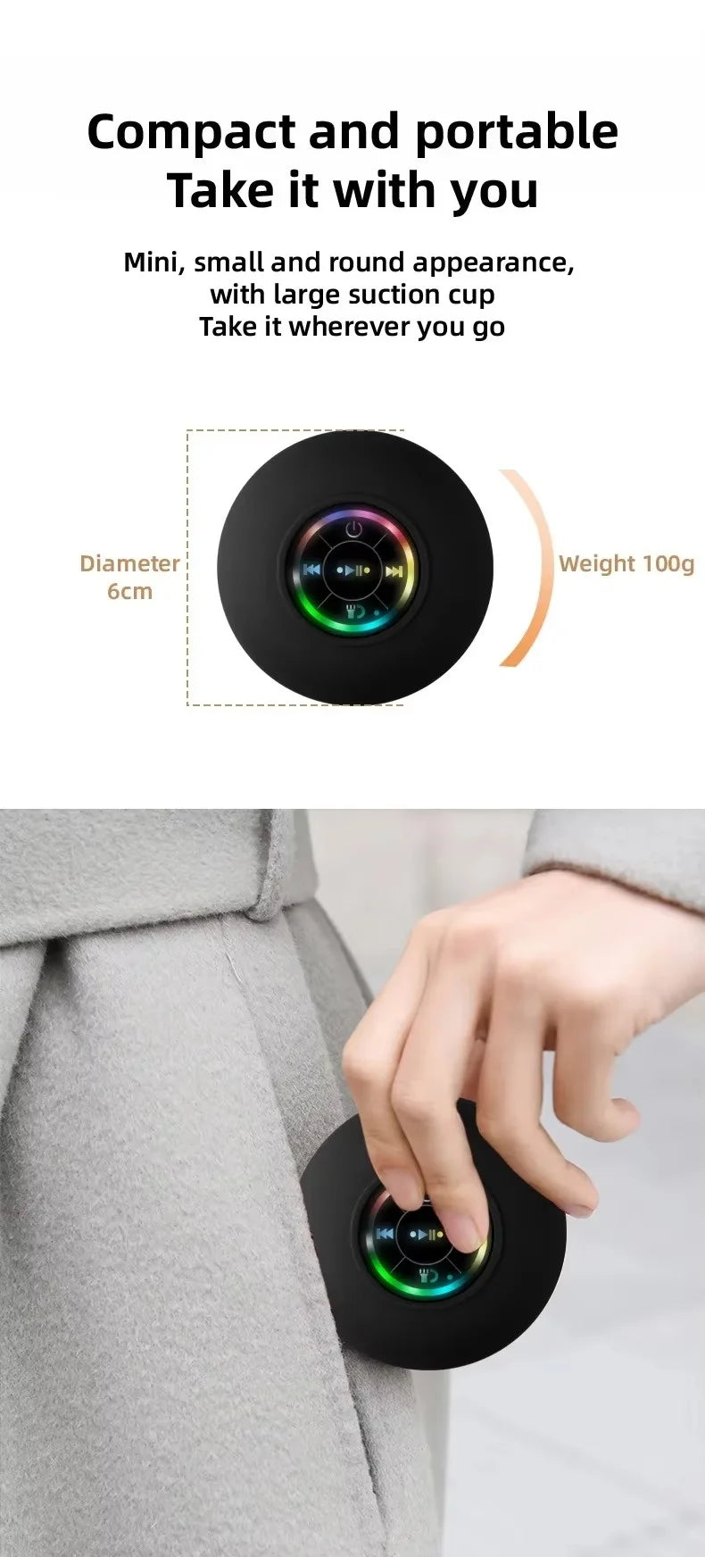 A hand is using a compact, round black suction cup device attached to clothing.