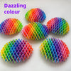 Juguetes antiestrés de plástico coloridos con forma de gusanos en varios colores brillantes