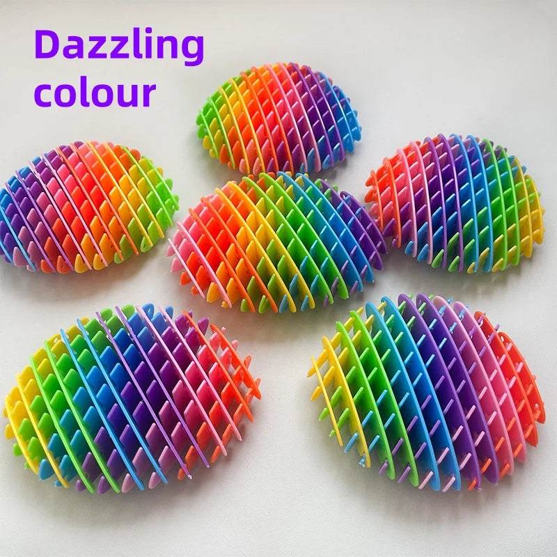 Juguetes antiestrés de plástico coloridos con forma de gusanos en varios colores brillantes