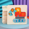 A wooden jigsaw puzzle featuring an orange and red construction vehicle with blue accents and yellow stars.