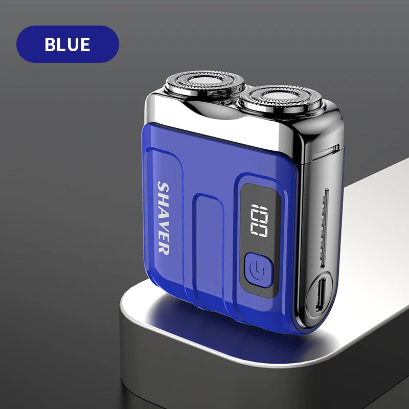 Una afeitadora eléctrica recargable mini USB azul con pantalla digital sobre una superficie gris.