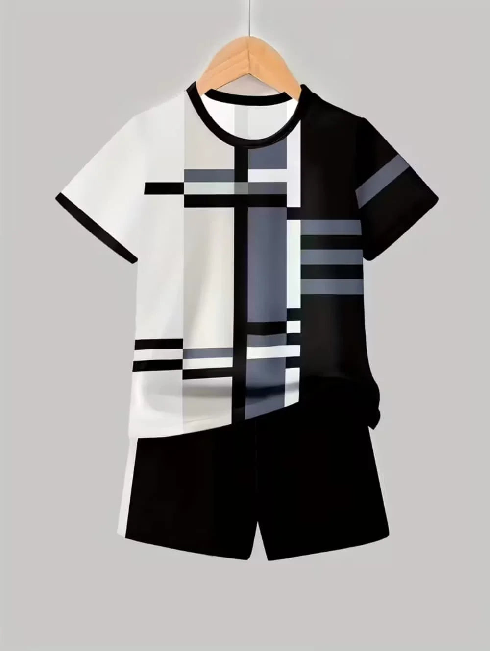 A black and white colorblock short sleeve t-shirt and matching shorts set displayed on a hanger.