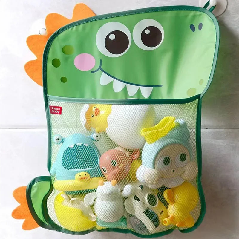 A green suction cup toy storage bag filled with various small plastic toys and accessories.