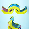 A yellow and purple foldable potty for kids shown in two views, demonstrating its deformable and easy to store features.