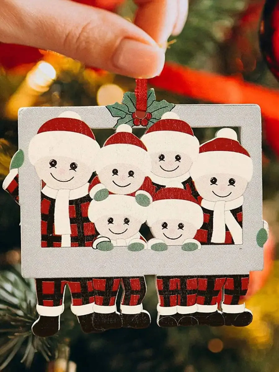 Personlig julepynt med bilderamme og fem figurer kledd som julenissen.