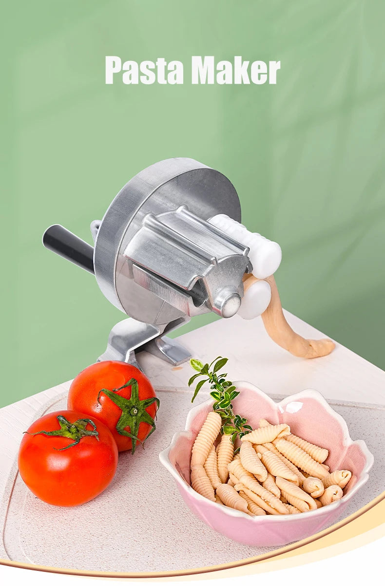 A silver pasta maker machine is shown next to fresh tomatoes and a bowl of homemade pasta.