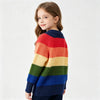 A young girl models a colorful rainbow striped knit sweater with long sleeves against a white background.