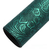 Roll of teal vintage floral textured faux leather fabric for handcrafted projects
