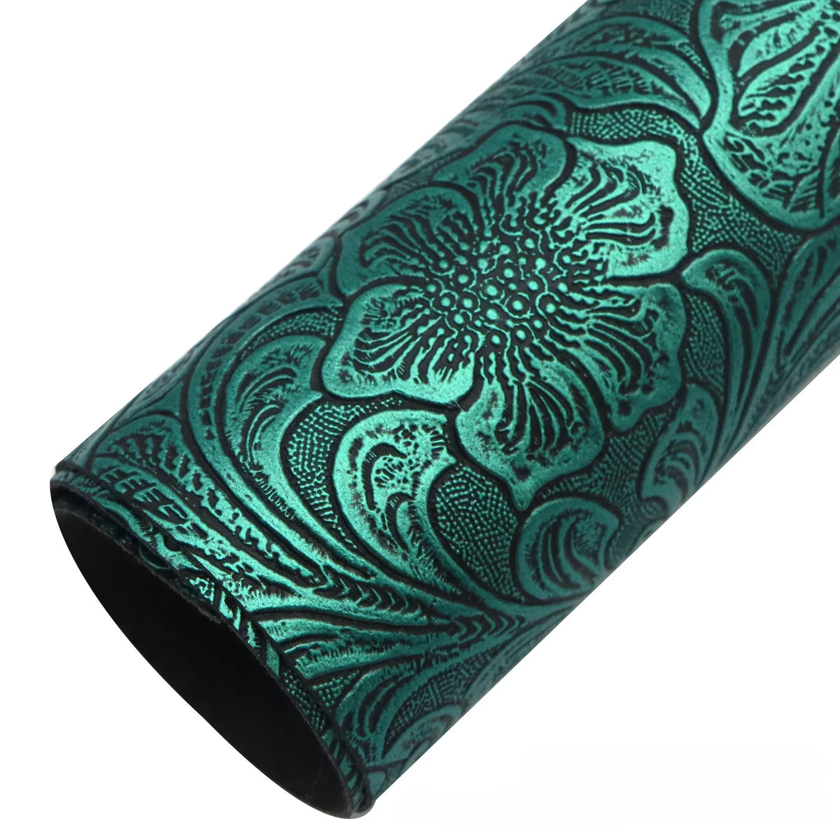 Roll of teal vintage floral textured faux leather fabric for handcrafted projects