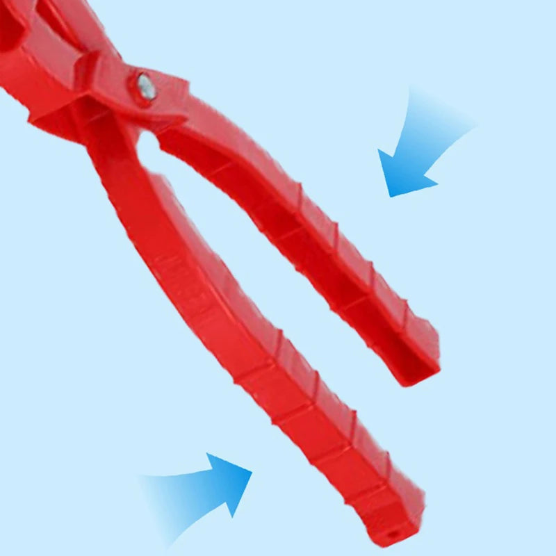 Red duck-shaped rice mold being used to form food items like sushi or snowballs.