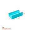 A light blue plastic marble run building block piece with dimensions 1.9cm by 6.4cm and 3.2cm.