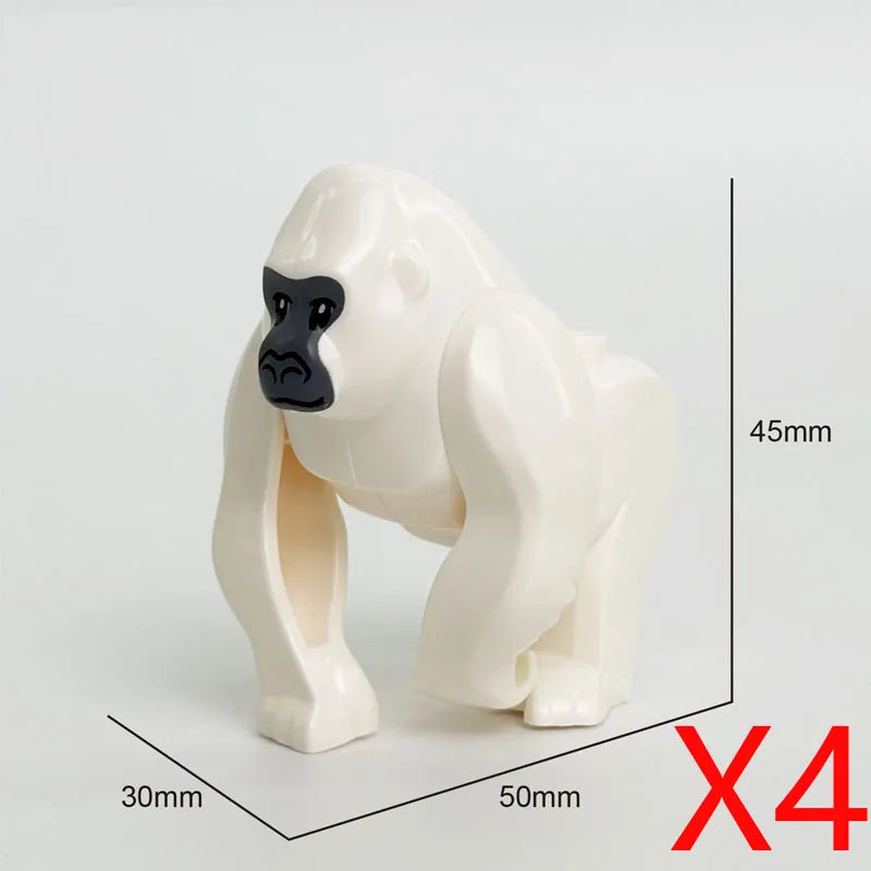 A white zoo figure building block with a black face, shown from the side.